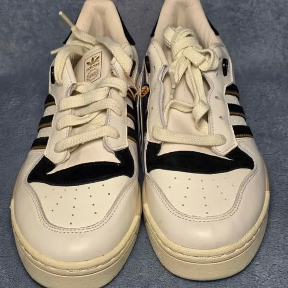 Adidas Rivalry 86 Low white black gold stripes Mens US 7 or Womens US 8